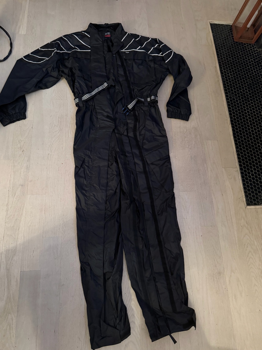 Triumph Black Men’s Motorcycle Jumpsuit with Striped Waist Detail